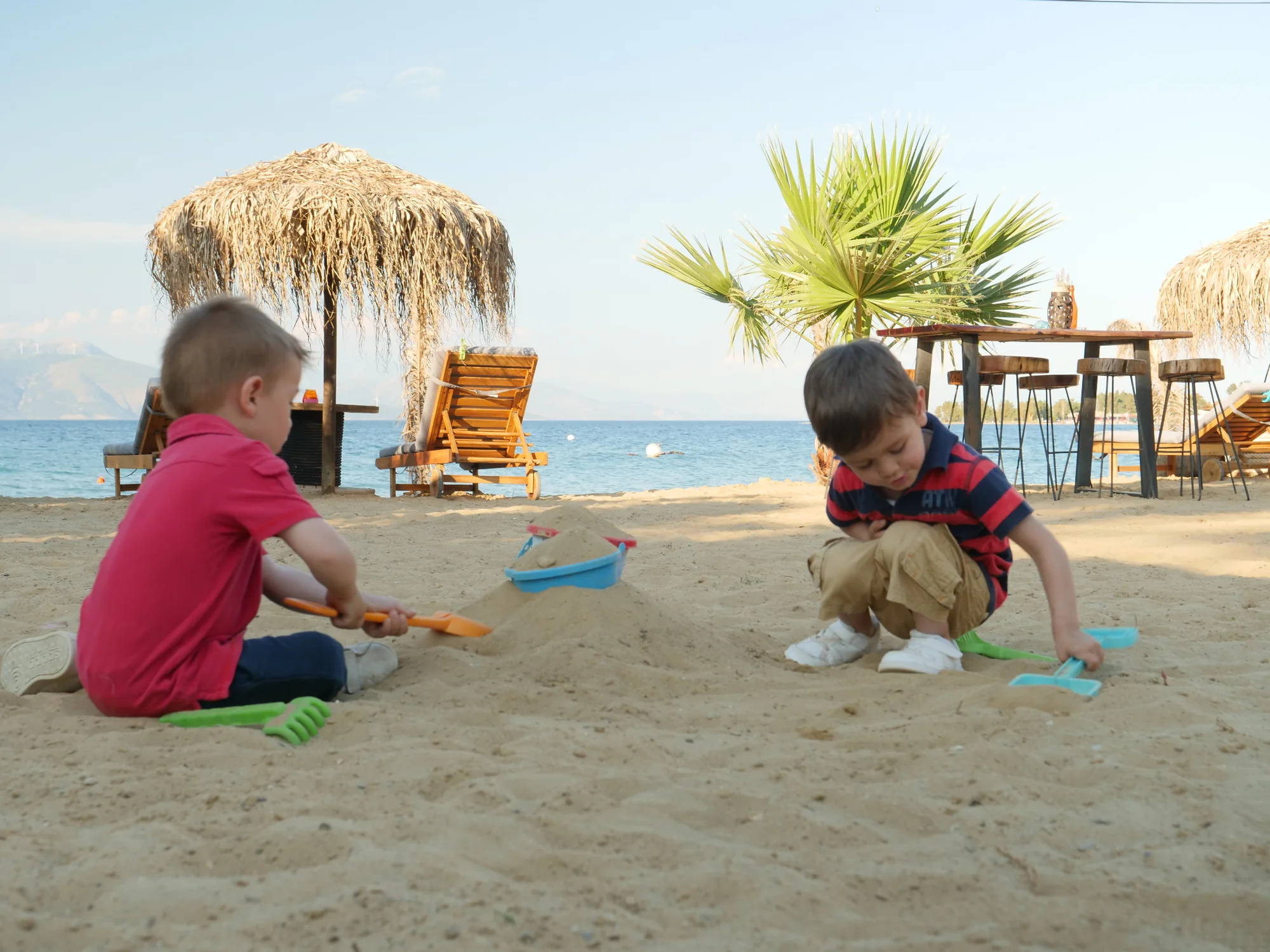 Children playing on the beach at Seacret Apartments